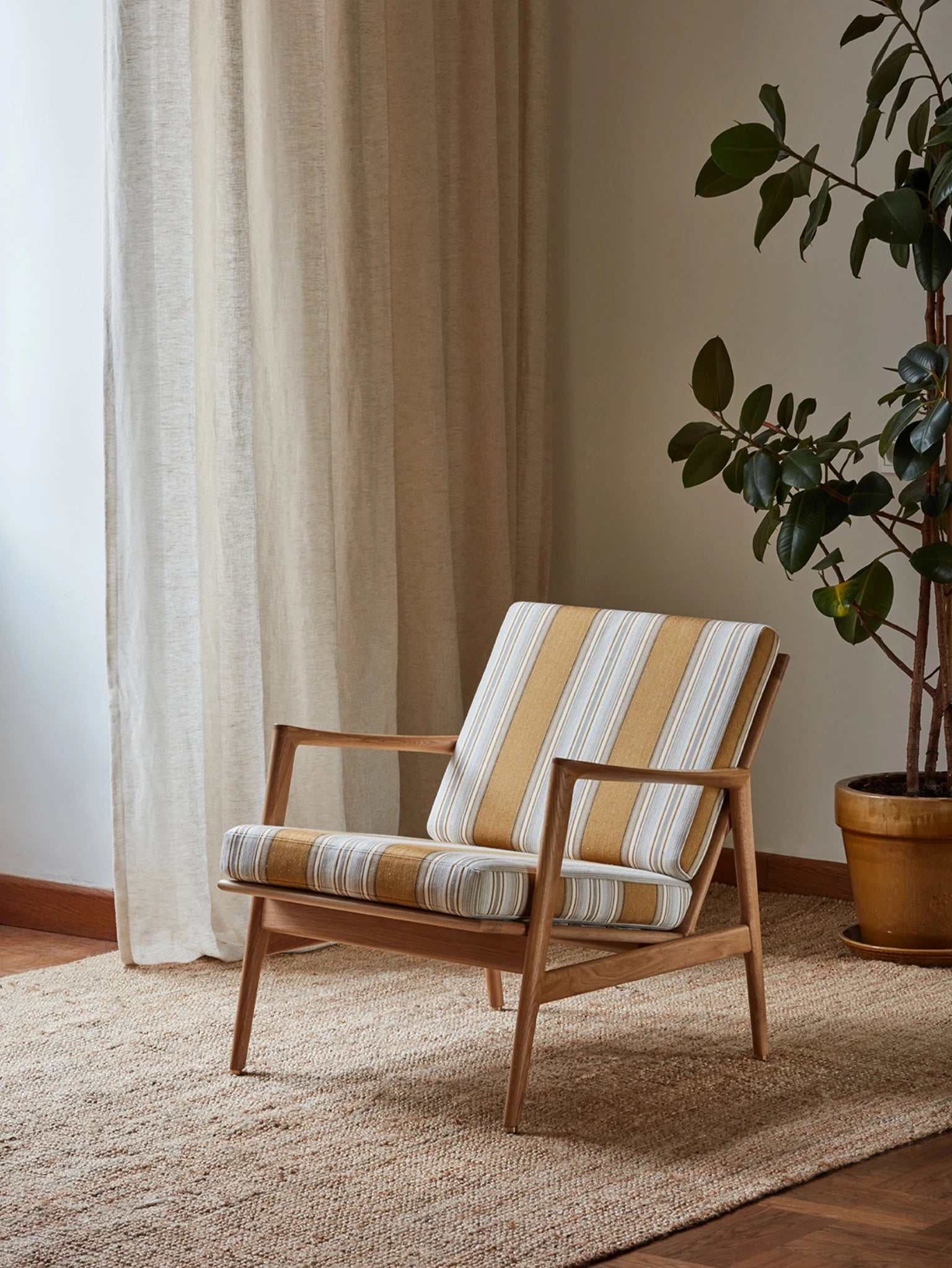 STEFAN LOUNGE CHAIR in Aveiro Ocre Casamance Fabric